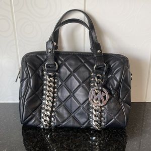 MICHAEL KORS leather speedy bag with attachable strap.